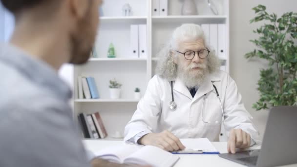 Professional Urologist Talking Male Patient Clinic Men Health Checkup — Stock Video