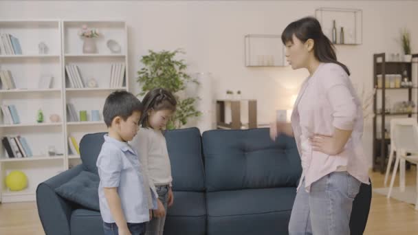 Upset Young Asian Mother Punishing Two Naughty Kids Child Upbringing — Stock Video