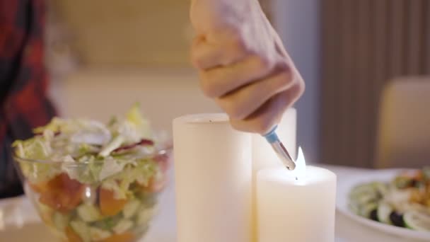 Boyfriend Using Candle Lighter Creating Romantic Atmosphere Home Surprise — Stock Video