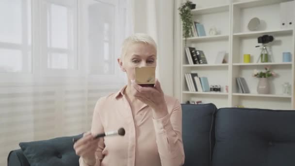 Middle Aged Lady Applying Powder Brush Admiring Mirror Reflection Smiling — Stock Video