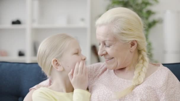 Grandmother Listening Little Girl Whispering Secret Her Ear Mutual Trust — Stock Video