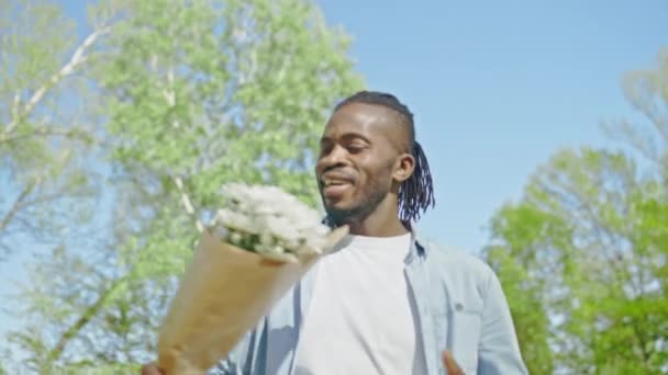 Happy Black Man Going Date Bouquet Flowers Dancing Joy — Stock Video