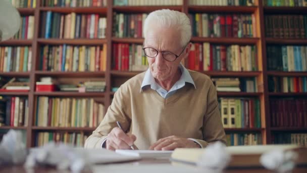 Senior Scientist Finishing Writing His Scientific Paper Last Book Chapter — Stock Video