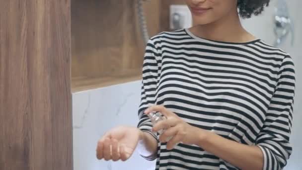 Smiling Woman Smelling Perfume Spraying Fragrance Wrist