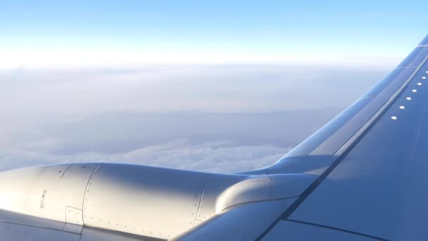 Airplane wing over clouds — Stock Video