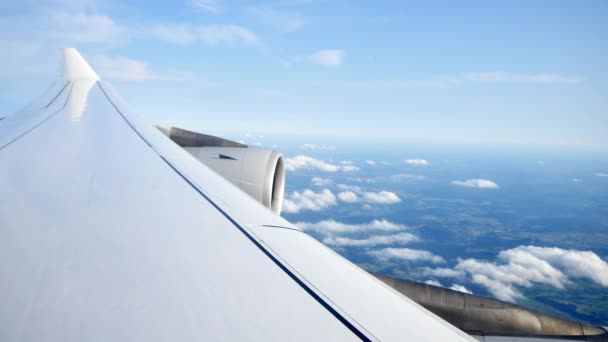 Airplane wing over clouds — Stock Video