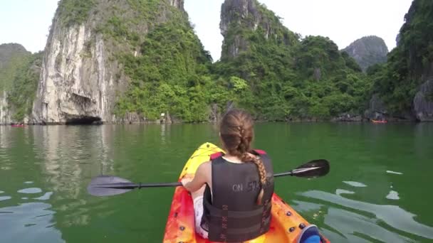 Woman Kayaking in ha long bay — Stock Video