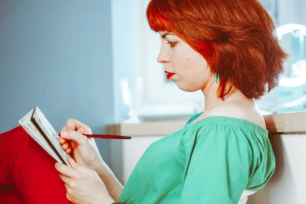 Girl Sitting Notepad Pencil Red Hair — Stock Photo, Image