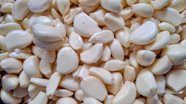 Bir yığın soyulmuş sarımsak deseni.