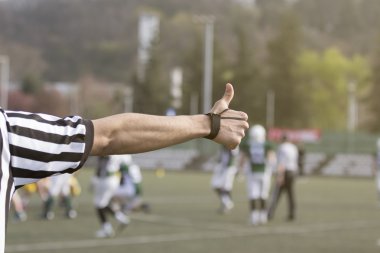 American football referee  showing thumb up clipart