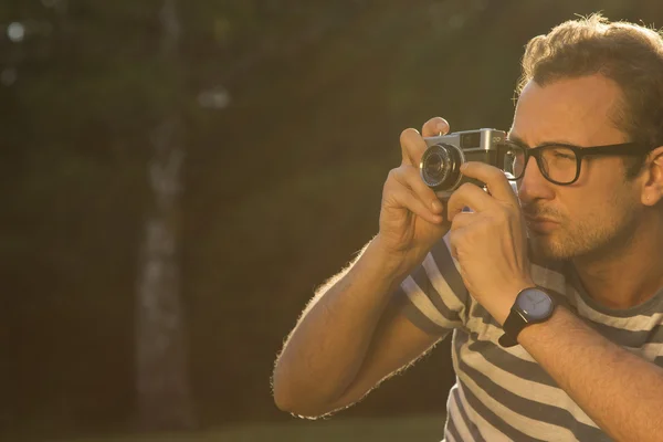 Photographer taking a shot outdoor