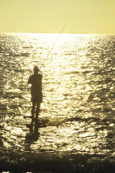 Pescador ao pôr do sol — Fotografia de Stock