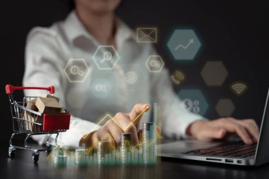 Çevrimiçi pazarlama kavramları gelecekteki iş dünyası çevre dostu. Mini alışveriş arabası ve sanal efektli madeni paralar..