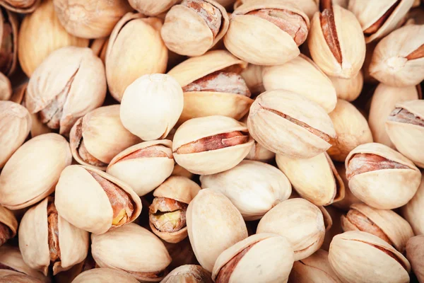 Pistachios nuci fundal — Fotografie, imagine de stoc