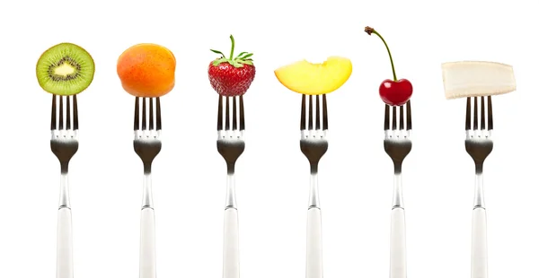 Fruits and vegetables on  forks — Stock Photo, Image