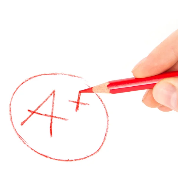 Kırmızı kalem ve mark A+ — Stok fotoğraf