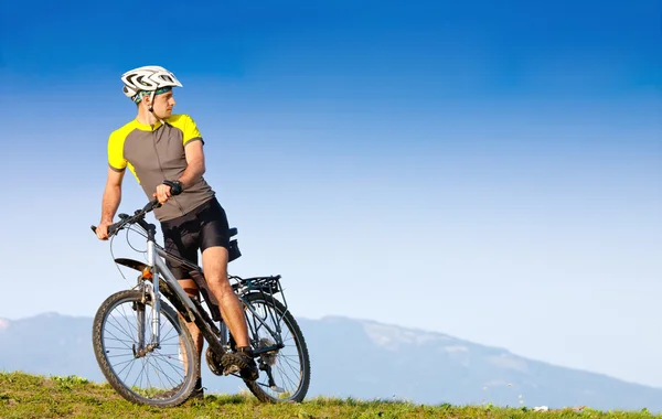 Mountain biker on sunny day — Stock Photo, Image