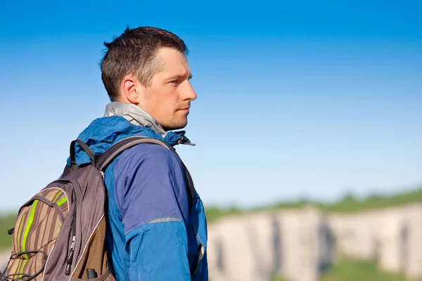 Young man with backpack Royalty Free Stock Images