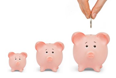 piggy banka para koyarak adam 