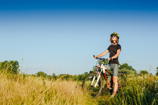 female biker standing