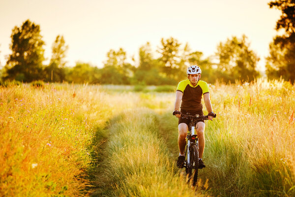 Cyclist Riding the Bike