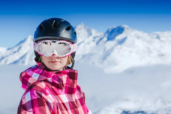 Woman  standing near a snowy slope — Stock Photo, Image