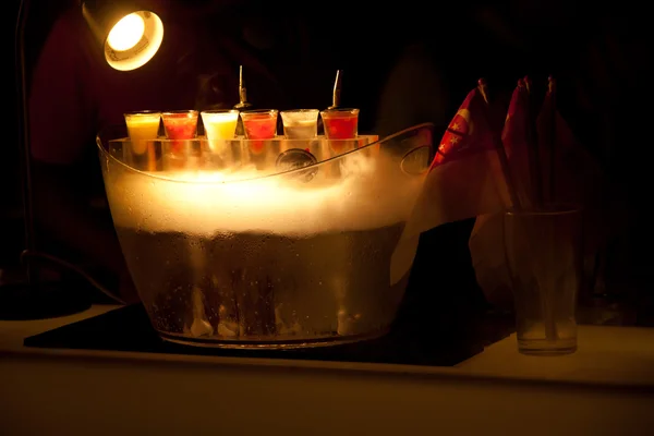 Silhouette of tricolor shots with dry ice in Singapore s Club — Stock Photo, Image
