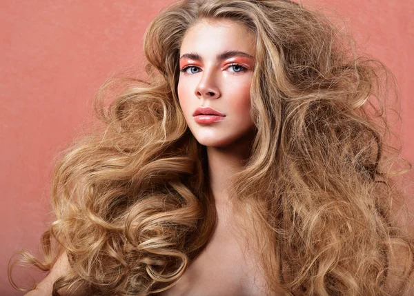 Beautiful blond with curly hair — Stock Photo, Image