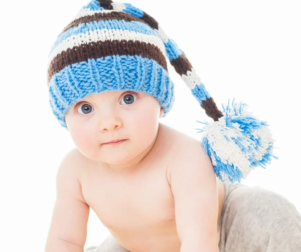 Cheerful baby in the blue hat — Stock Photo, Image