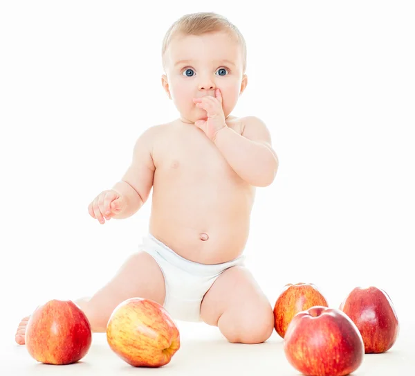 Bebê bonito com maçãs — Fotografia de Stock