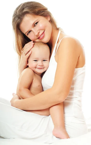 Mãe e bebê brincando e sorrindo — Fotografia de Stock