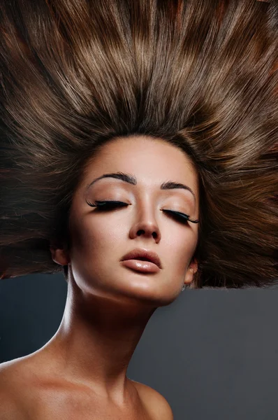 Beautiful woman with magnificent hair — Stock Photo, Image