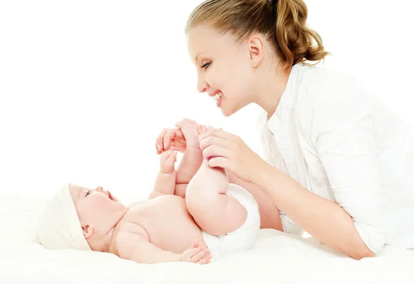 Madre y bebé jugando y sonriendo — Foto de Stock