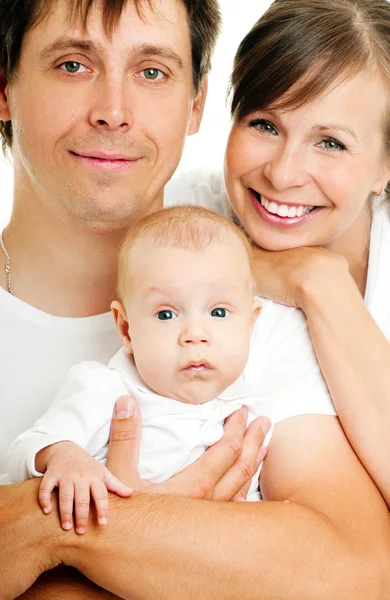 Gelukkig jonge gezin met baby — Stockfoto