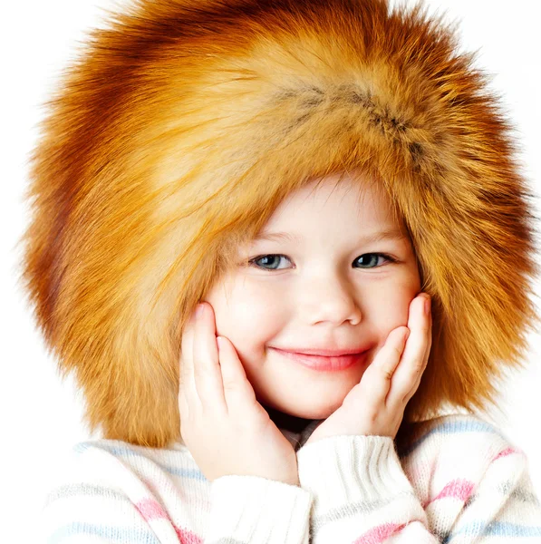 Cheerful girl in a fur hat — Stock Photo, Image