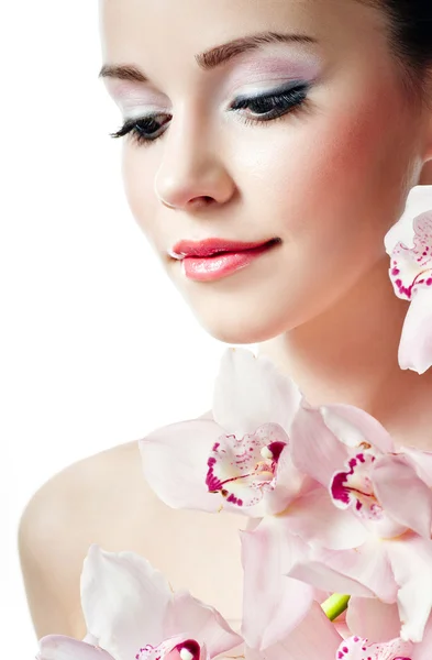 Fille avec orchidée rose — Photo