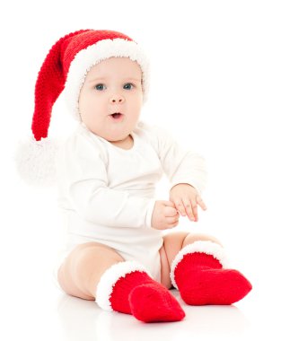 Kırmızı şapkalı Noel çocuğu.