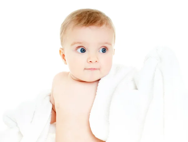 Sød baby i et håndklæde - Stock-foto