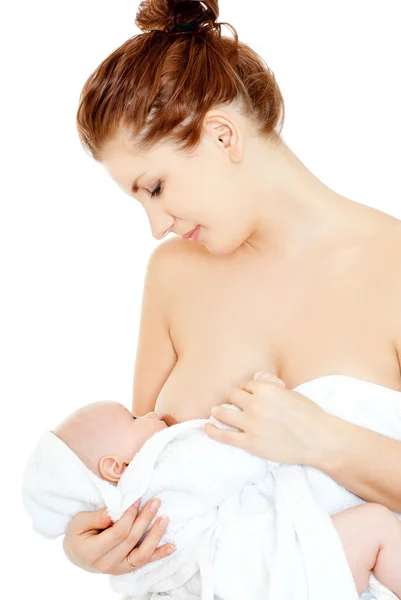 Мати годує грудьми дитину — стокове фото