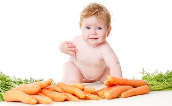 Bebê bonito com legumes — Fotografia de Stock