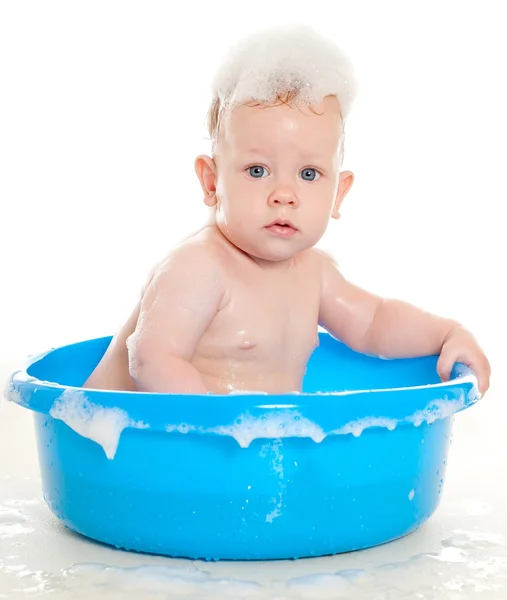 Kid in the soap foam — Stock Photo, Image