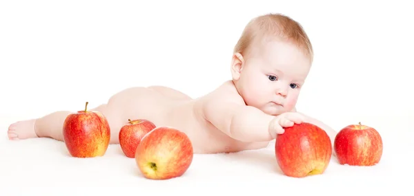 Cute baby z jabłkami — Zdjęcie stockowe