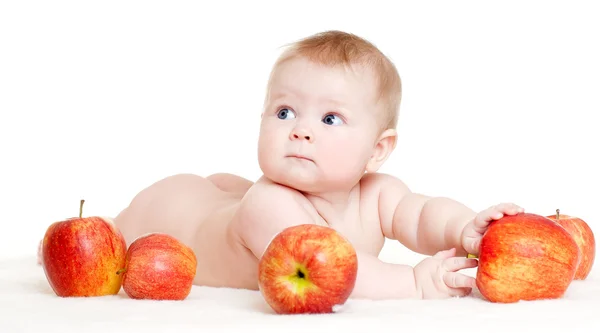Bebê bonito com maçãs — Fotografia de Stock