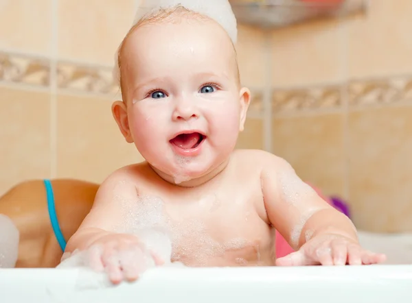 Cute baby in a bathroom — Stock Photo, Image