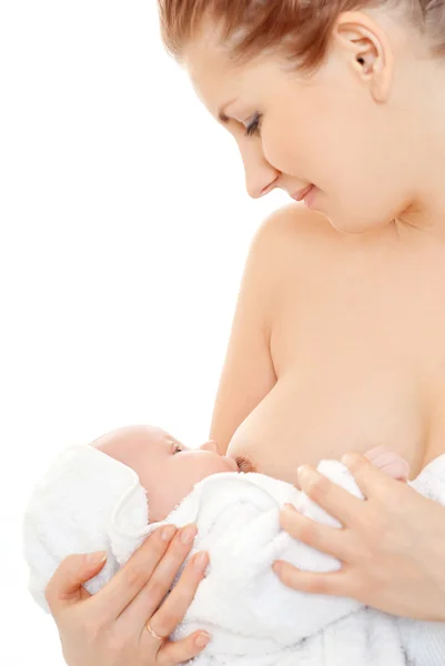 Mother breast feeding her infant Stock Picture