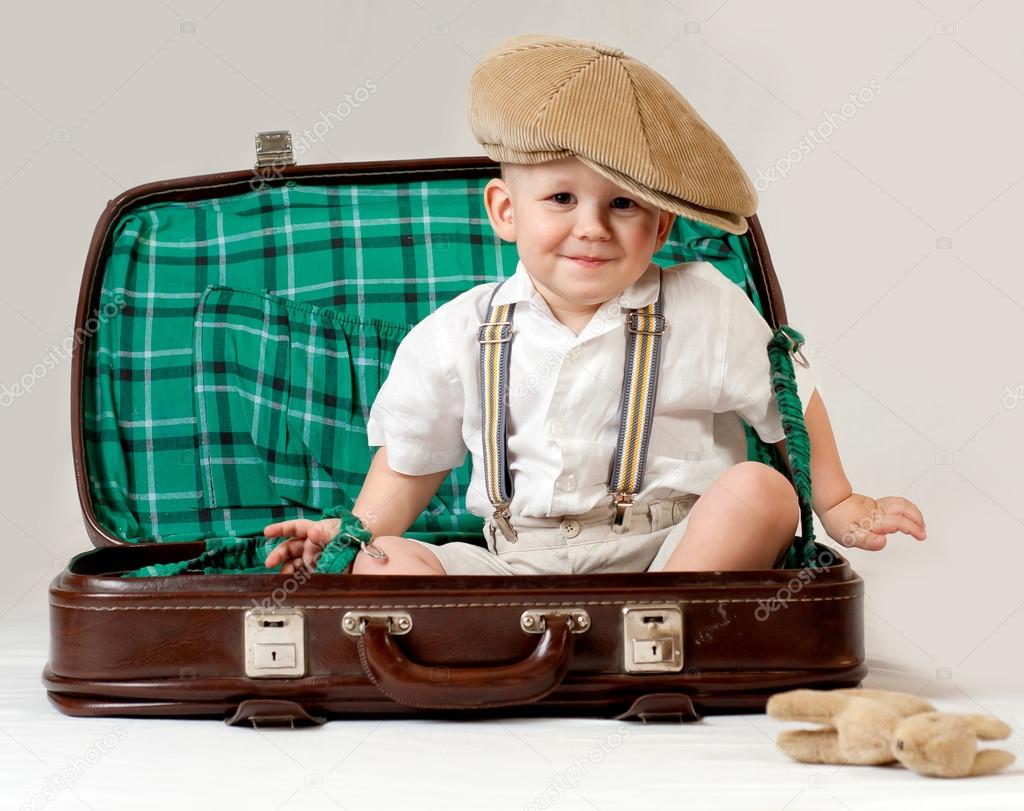Cute suitcase boy