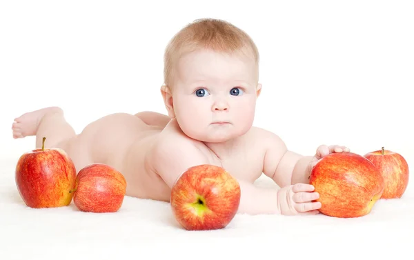 Bebê com maçãs vermelhas — Fotografia de Stock