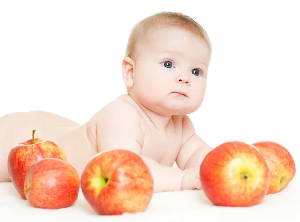 Bebê com maçãs vermelhas — Fotografia de Stock