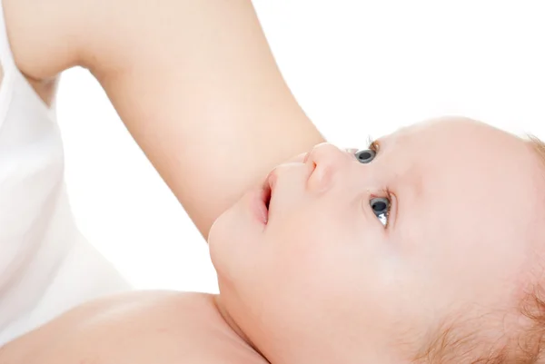 Niño en manos de la madre —  Fotos de Stock