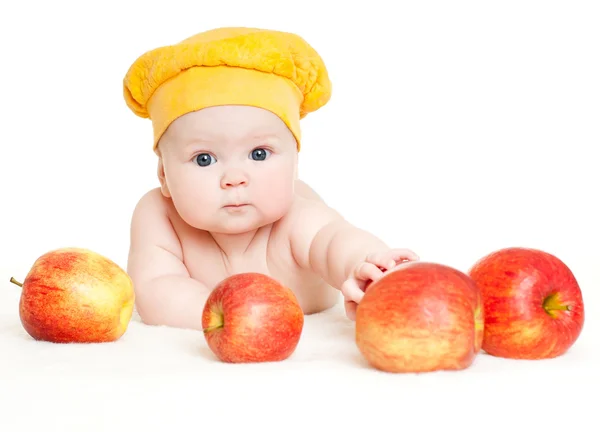 Bebê bonito com maçãs — Fotografia de Stock